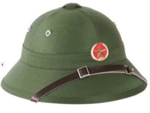 The classic styled VIETCONG VIETNAM green pith helmet complete with badge
